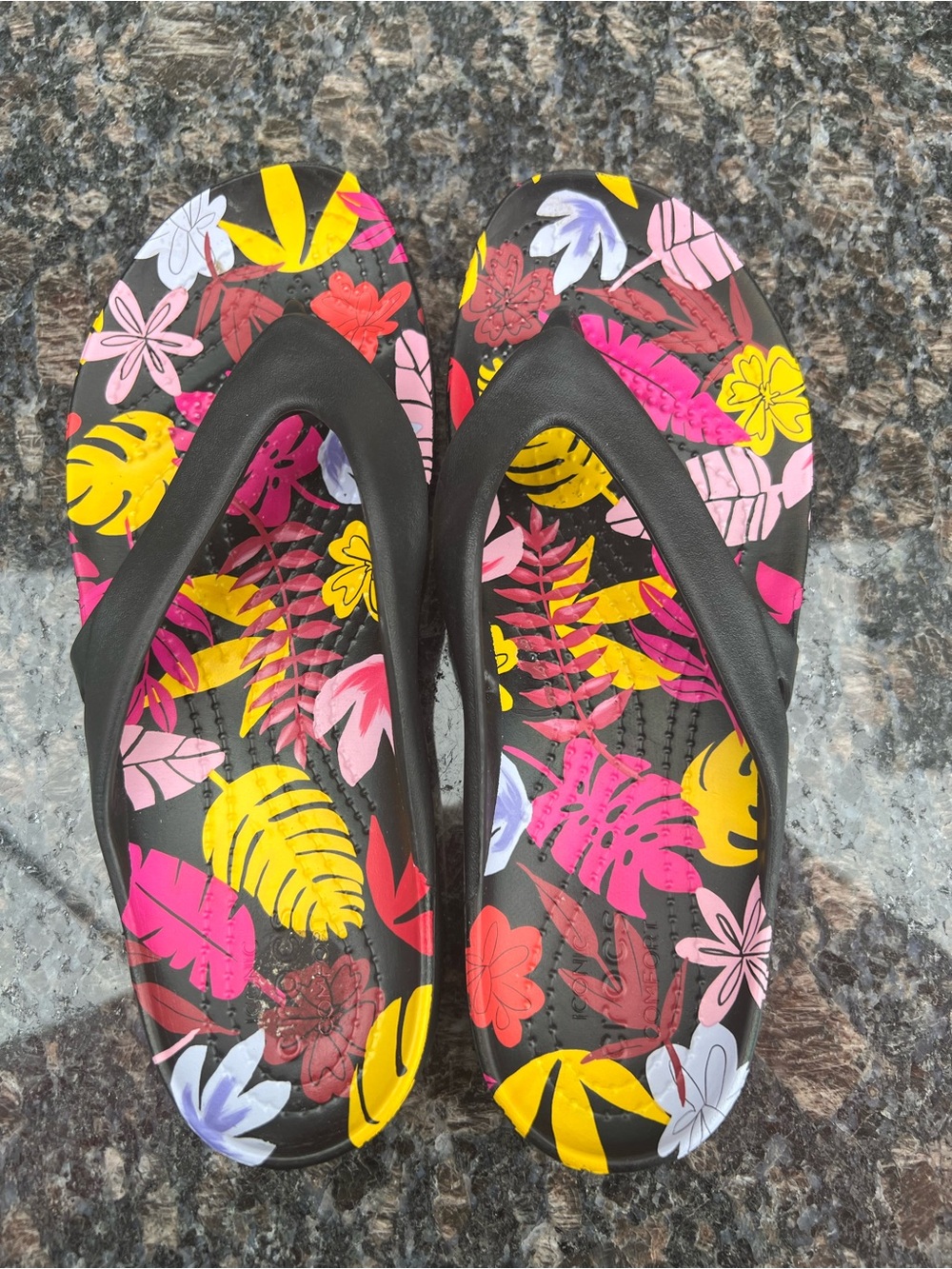 CROCS Women’s Black Flip Sandals with Pink, Yellow & Red Floral Print